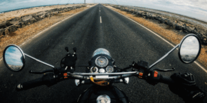 Motorcycle POV on a long straight road