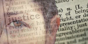 Collage of a dictionary page with the word "justice" overlaid on a closeup of a woman's face looking into the camera.