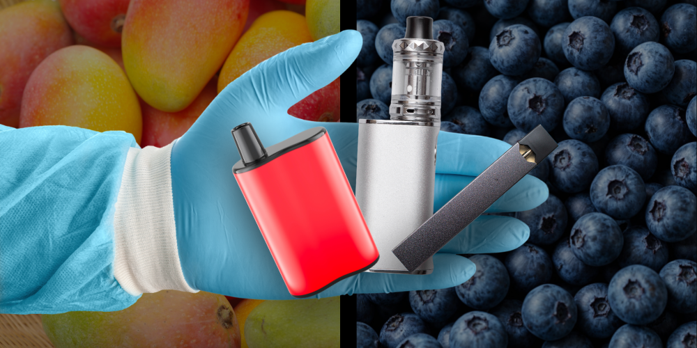 background of mangoes and blueberries. blue-gloved hand overlaid, holding 3 different vapes.